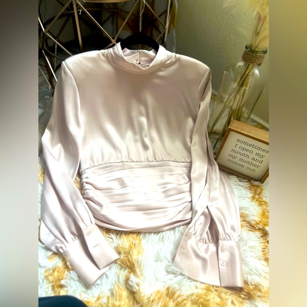 Aritzia bought Classy Top